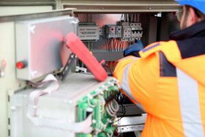 man performing industrial equipment troubleshooting