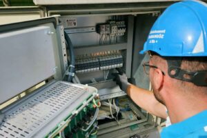 person troubleshooting industrial control systems