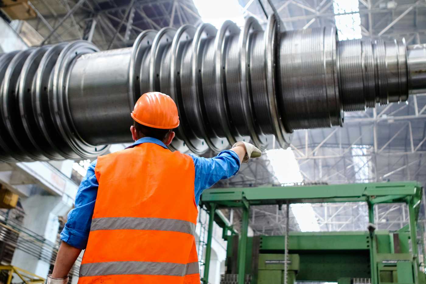 person performing preventive maintenance for manufacturing
